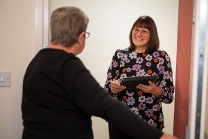 whg colleague talking to customer