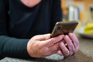Photo of person looking at phone